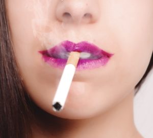 How does smoking affect my teeth and gums